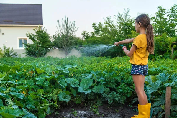 Child Watering Garden Hose Selective Focus Nature — Stok Foto