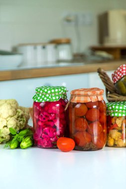 Jars with preserved vegetables for the winter. Selective focus. Food.