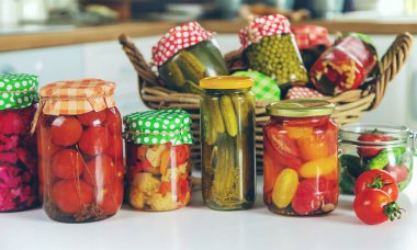 Jars with preserved vegetables for the winter. Selective focus. Food.