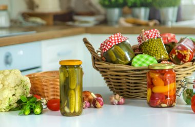 Jars with preserved vegetables for the winter. Selective focus. Food.