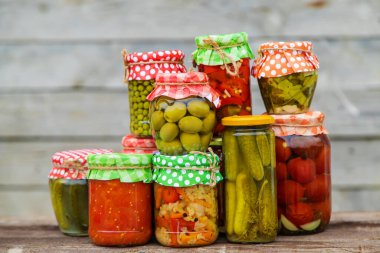 Jars with preserved vegetables for the winter. Selective focus. Food.