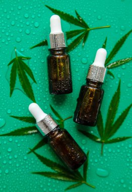 Cannabis oil on a wet background. Selective focus. Spa.