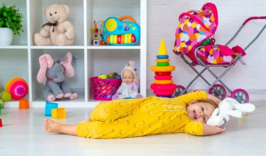 Children play with toys in the room. Selective focus. Kid.