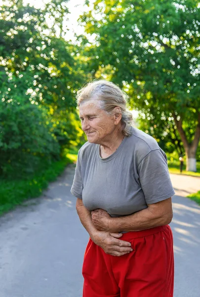 Grandmother Has Stomach Ache Road Selective Focus People — Stockfoto