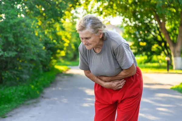Grandmother Has Stomach Ache Road Selective Focus People — Stockfoto