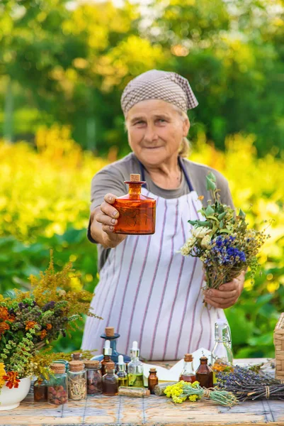 Grandmother Makes Tinctures Medicinal Herbs Selective Focus People — Stockfoto