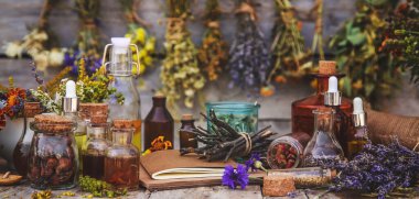 Medicinal herbs and tinctures homeopathy. Selective focus. Nature.