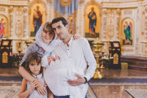 Family photo in the church. Selective focus. People.