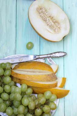 Kavun ve bir bardak suyla sakin bir hayat.