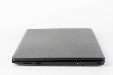 Modern, new office  black  laptop  on white background, side view. USB 2.0 port, vga port. 