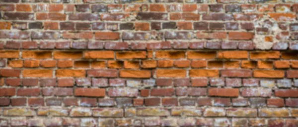 Kırmızı tuğla duvar dokusunun arka planı. Harabe kale.