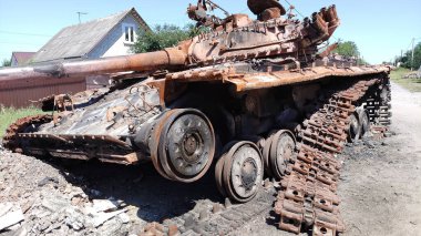 Destroyed tank on the street of the village of Ukraine