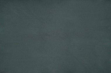 The texture of olive velvet fabric - top view and a close-up of a fragment of green velvet