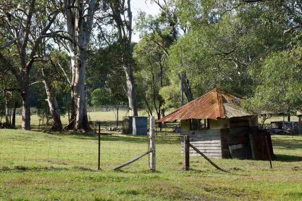 stock image Old disused meat house previously used to hang home butchered meat now only a storeroom on a rural farm.                                                       