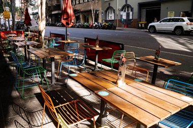 Sidewalk footpath seating for a restaurant in Brisbane, Queensland.