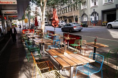 Sidewalk footpath seating for a restaurant in Brisbane, Queensland.
