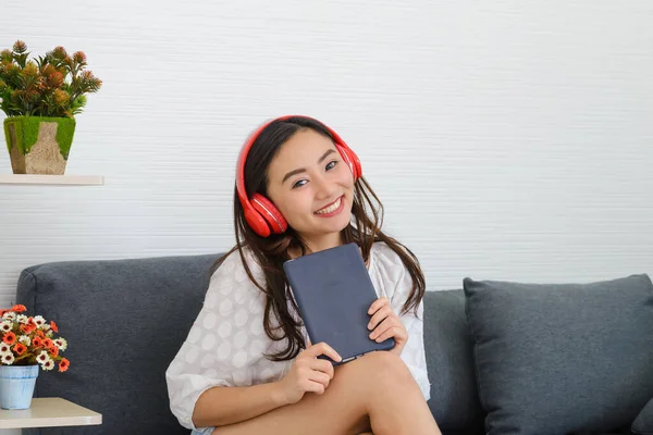 Young Asian Woman Wear Red Headphones Relaxing Listening Music While — Stock Photo, Image