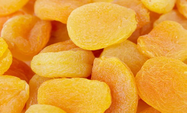 Torkade aprikoser struktur. Ingredienser för matlagning. Hälsosam mat — Stockfoto