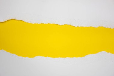 Torn white stripes on a yellow background. Place for text. Copy space.