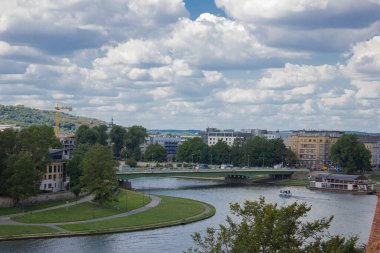 City landscape. View of the bridge across the river.