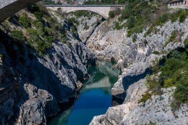 The gorges of the Herault, and the Devil's Bridge, in the Occitanie region, France.