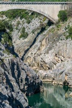 The gorges of the Herault, and the Devil's Bridge, in the Occitanie region, France.