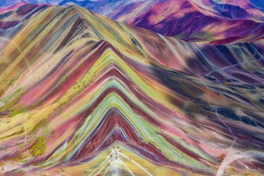Aerial view of the Rainbow Mountains (Montana de Siete Colores) in Peru with Vinicunca in the center. clipart