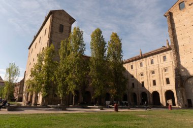 A glimpse of the Palazzo della Pilotta, Parma, Italy, framed in an arch. High quality photo