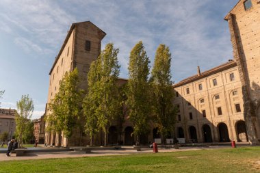 A glimpse of the Palazzo della Pilotta, Parma, Italy, framed in an arch. High quality photo