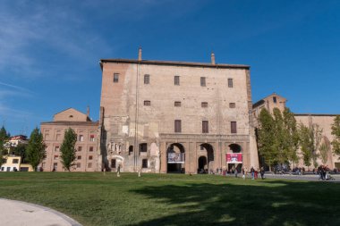 A glimpse of the Palazzo della Pilotta, Parma, Italy, framed in an arch. High quality photo