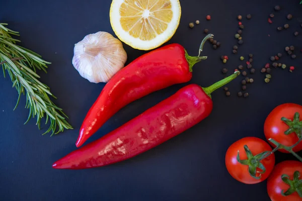 Red Vegetables Black Background Peppers Tomatoes Garlic — Stock Photo, Image