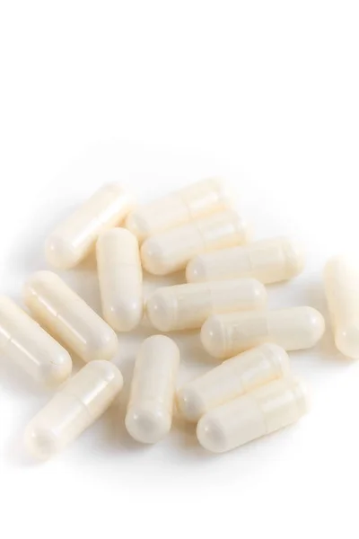 Close Couple White Pills Capsules Isolated White Background Selective Focus — Stock Photo, Image