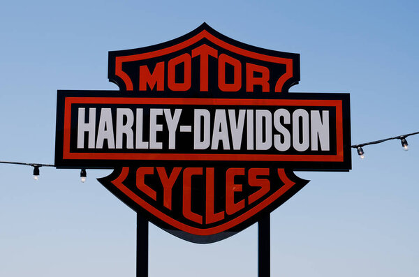 Portoroz, Slovenia. 06.12.2022.  Cool bikers Harley Davidson festival, exhibition. Local Signage against blue sky