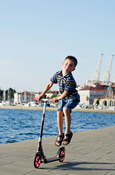 Happy Family Lifestyle Holiday Concept Little Boy Riding Scooter Walking — Stock Photo, Image