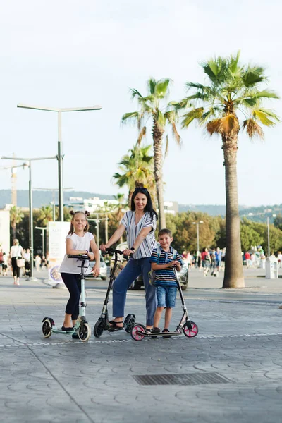 Happy Family Lifestyle Holiday Concept Mother Little Boy Girl Riding — Stock Photo, Image