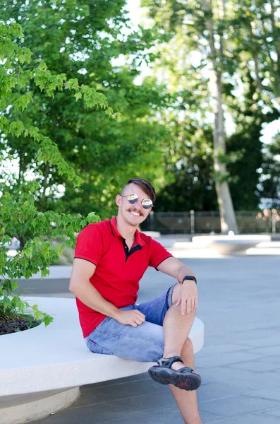 Young Happy Handsome Bearded Man Tourist Sitting Park Smiling Relaxing — Fotografia de Stock