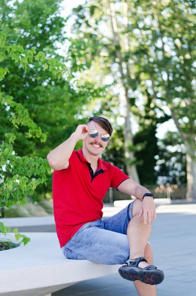 Young Happy Handsome Bearded Man Tourist Sitting Park Smiling Relaxing — Fotografia de Stock