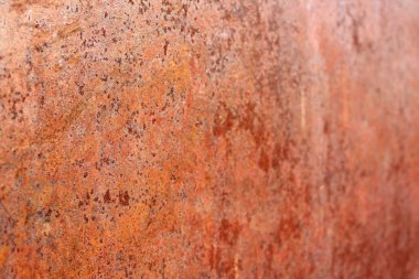 Paslı arka plan, yakın plan paslı kırmızı metal yıpranmış eski yüzey. 