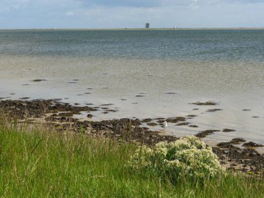 Holstein-Holstein eyâletinde, Maasholm ve Eckernfoette 'nin küçük bir köyü.