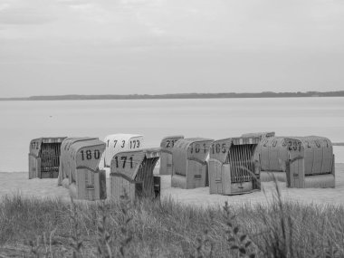 Holstein-Holstein eyâletinde, Maasholm ve Eckernfoette 'nin küçük bir köyü.