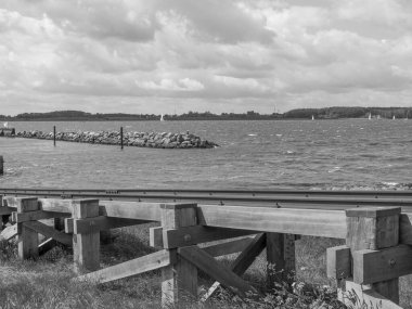 Holstein-Holstein eyâletinde, Maasholm ve Eckernfoette 'nin küçük bir köyü.