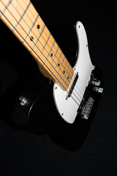 Vaduz, Liechtenstein, January 13, 2022 Product shot of a mexican Fender Telecaster electric guitar in black and white