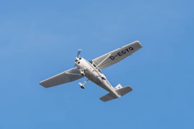 Saint Gallen, Altenrhein, Switzerland, February 12, 2022 Cessna 182 propeller plane just after take off from runway 28 clipart