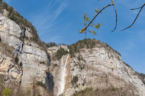 stock image Weesen, Switzerland, April 13, 2022 Impressive waterfall in the alpine mountains