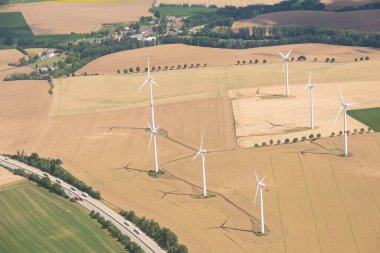 Meissen, Saxony, Germany, July 11, 2022 Wind power stations on a field seen from a small plane