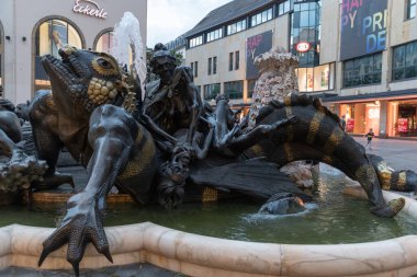 Nuremberg, Bavaria, Germany, July 9, 2022 Hans Sachs water fountain with different figures in the old town