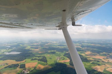 Baden Wurttemberg, Germany, July 8, 2022 Discovering the area in a small propeller plane