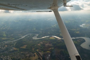 Olpe, North rhine Westphalia, Germany, July 8, 2022 Flight overhead the lake Biggesee with a small plane