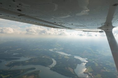 Olpe, North rhine Westphalia, Germany, July 8, 2022 Flight overhead the lake Biggesee with a small plane