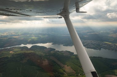 Sundern, North rhine Westphalia, Germany, July 8, 2022 Flight overhead the lake Sorpesee with a small plane